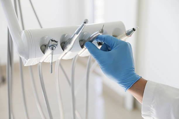 Professional Invisalign Clear Aligners technician working in Sagamore, MA